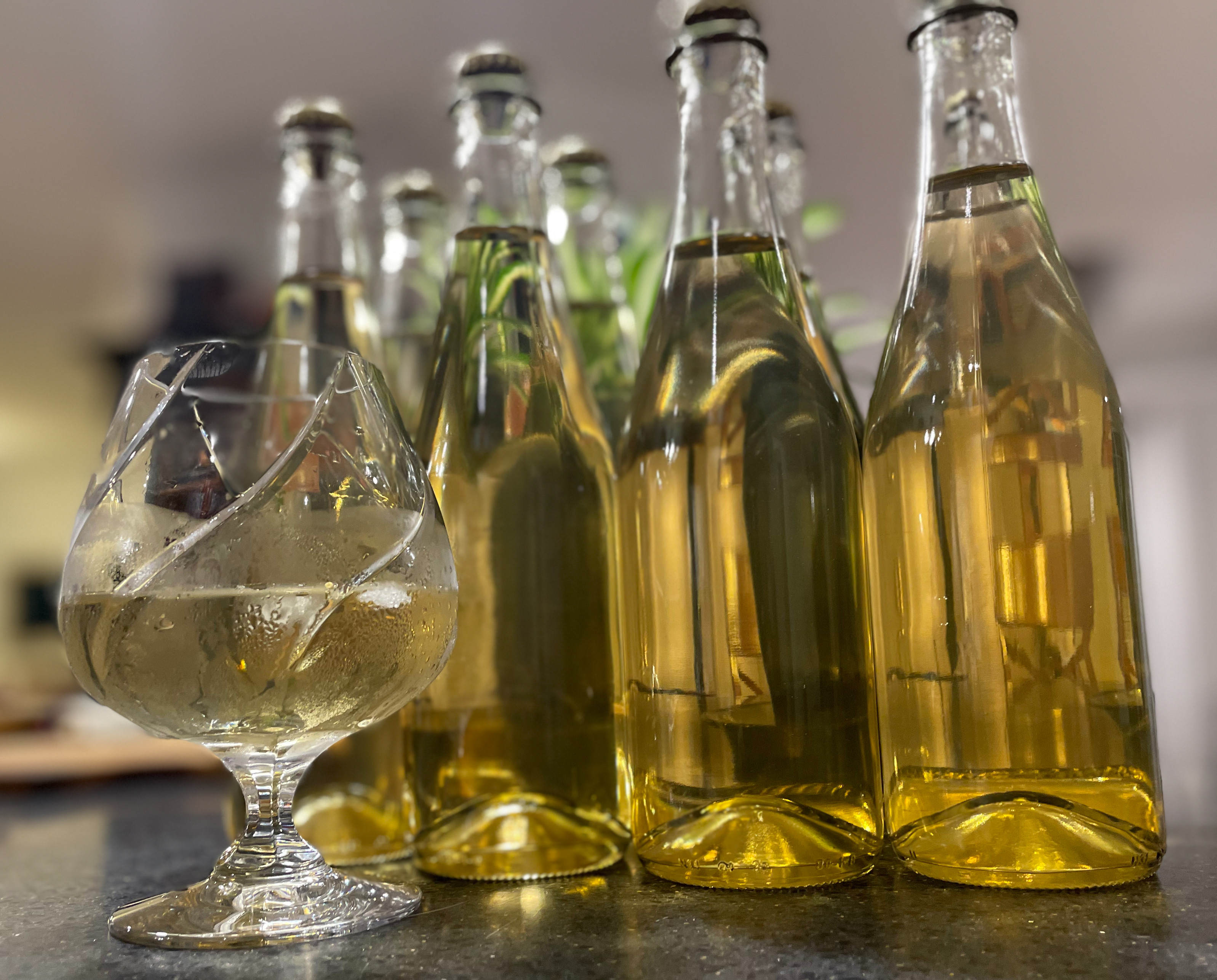 Bottled mead and glass